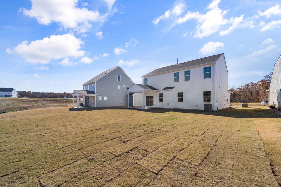 Exterior details and patio area of a home in Monterra, Kernersville (Image 21).