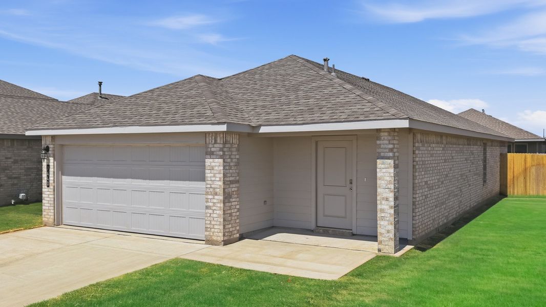Front exterior of a new home in Terra Vista, Lubbock, TX, highlighting curb appeal (Image 2). Front exterior of a new home in Terra Vista, Lubbock, TX, highlighting curb appeal (Image 2).