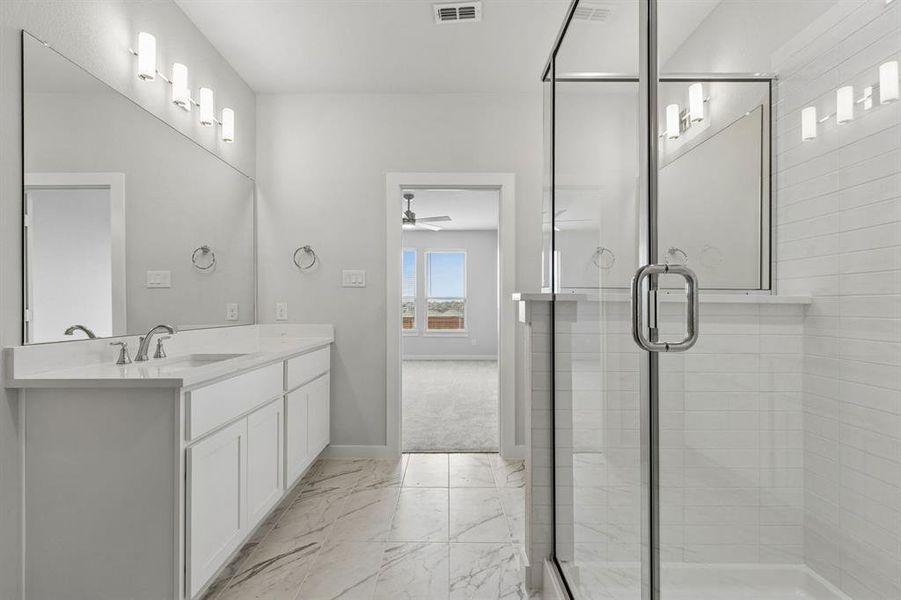 Primary Bathroom in the Winters home plan by Trophy Signature Homes – REPRESENTATIVE PHOTO Primary Bathroom in the Winters home plan by Trophy Signature Homes – REPRESENTATIVE PHOTO