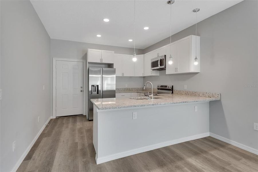 Furnished interior view inside a new home in , Deland (Image 10).