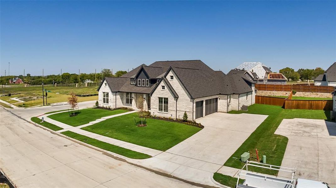 Front exterior of a new home in Winding Creek, Rockwall, TX, highlighting curb appeal (Image 26).