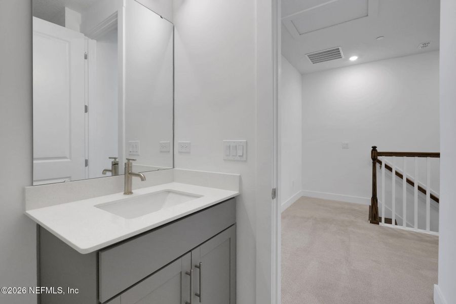 Furnished interior view inside a new home in North Beach Townhomes, Jacksonville Beach (Image 6).