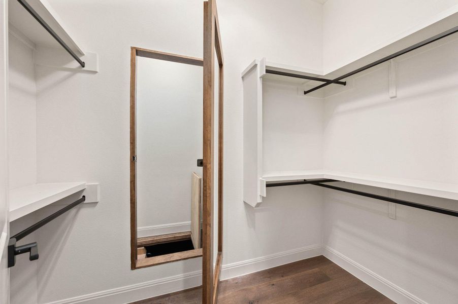 Entrance to hidden underground bunker behind mirror in closet