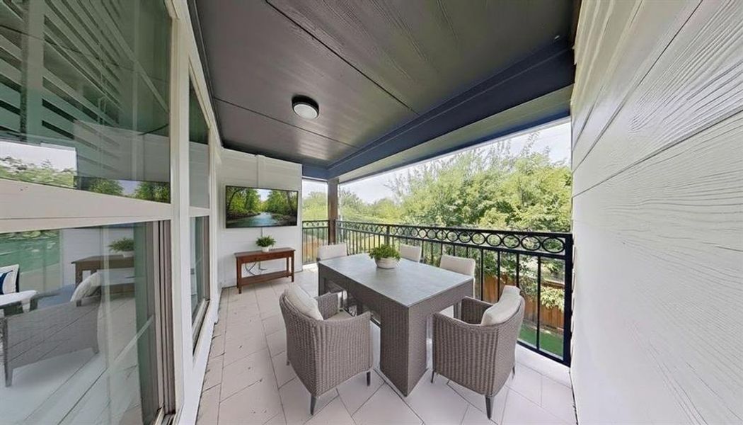 Balcony with outdoor dining area