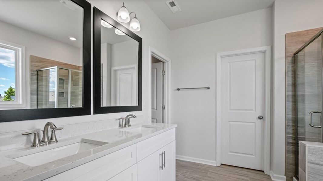 Representative furnished interior of a home built from the Lucas by D.R. Horton in The Manors at Haywood Glen, Knightdale (Image 11).
