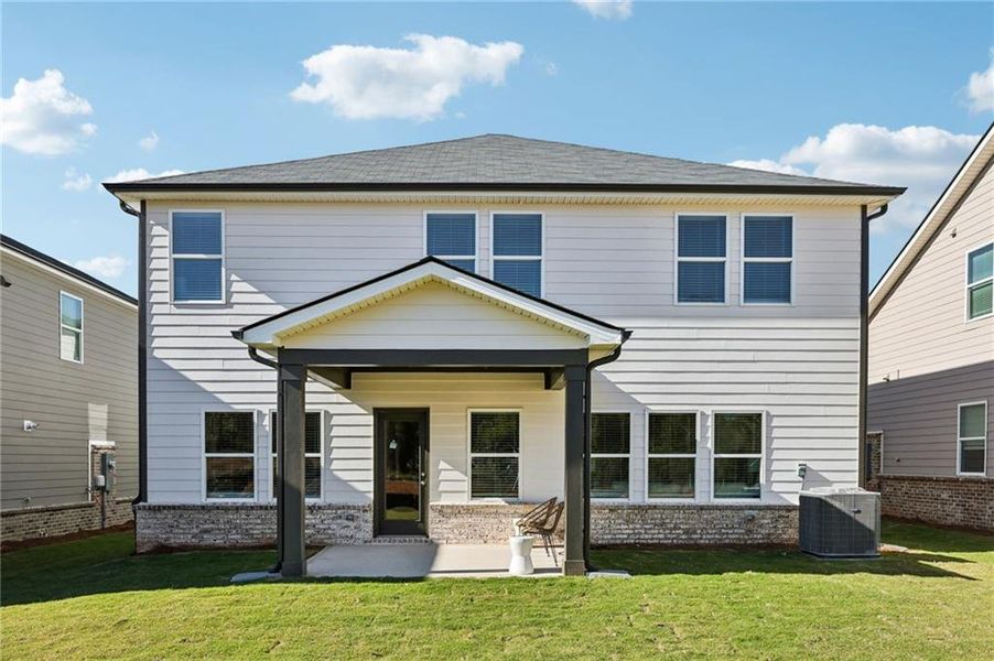Exterior details and patio area of a home in Westmont Preserve, Powder Springs (Image 4).