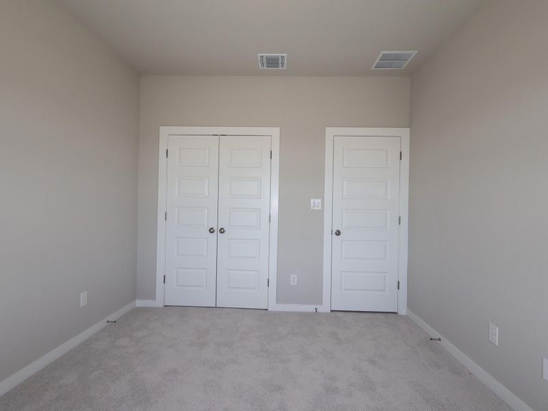 Spacious, unfurnished interior of a new home in Heritage, Dripping Springs (Image 14).