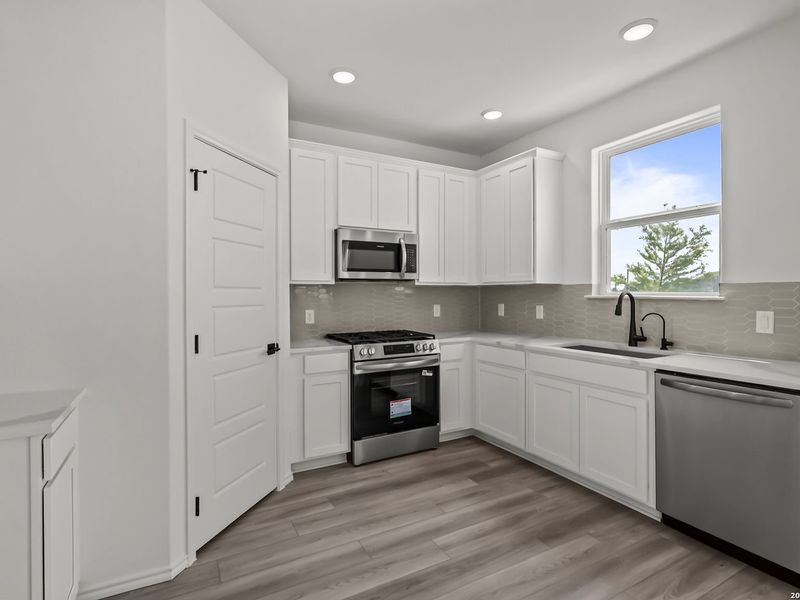 Furnished interior view inside a new home in Meadows at Oak Creek, San Antonio (Image 6).