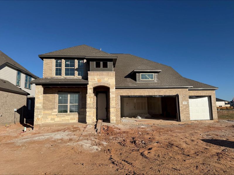 Welcome home to 2020 Blue Mar Drive located in the master planned community of Sunterra and zoned to Katy ISD.