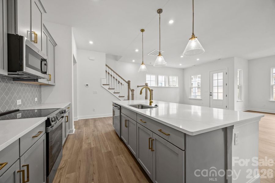 Furnished interior view inside a new home in The River District Townhomes, Charlotte (Image 3).