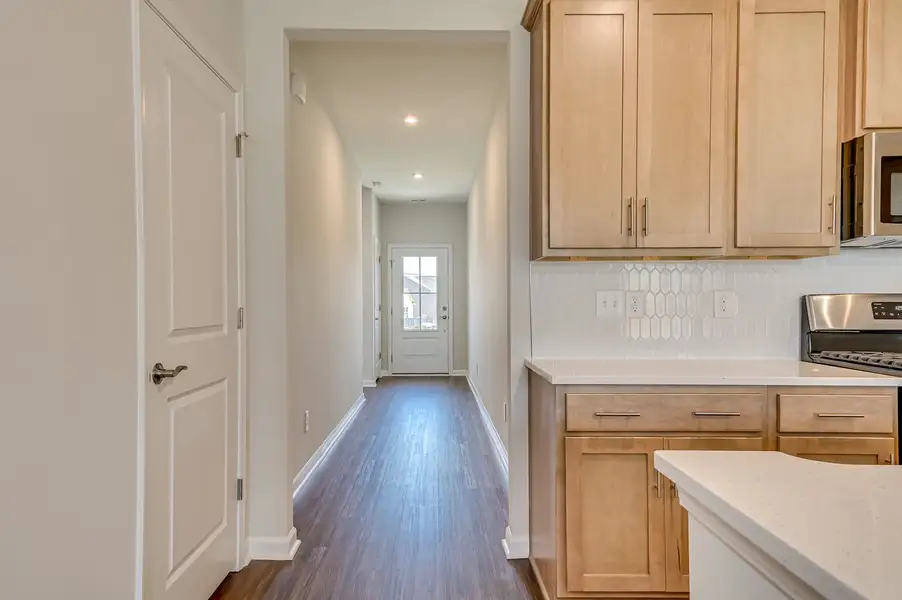 Furnished interior view inside a new home in The Beacon at Old Peachtree Single Family Homes, Lawrenceville (Image 9).