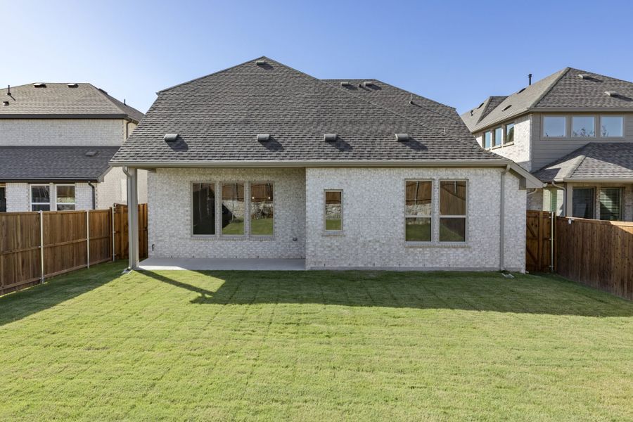 Exterior details and patio area of a home in Meadow Run, Melissa (Image 2). Exterior details and patio area of a home in Meadow Run, Melissa (Image 2).