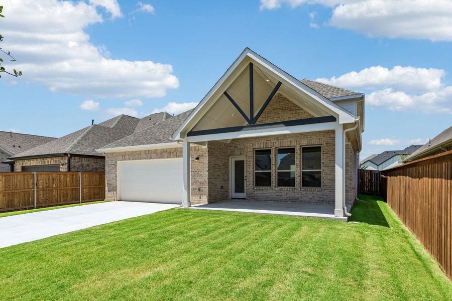 Front exterior of a new home in Dove Hollow, Waxahachie, TX, highlighting curb appeal (Image 2). Front exterior of a new home in Dove Hollow, Waxahachie, TX, highlighting curb appeal (Image 2).