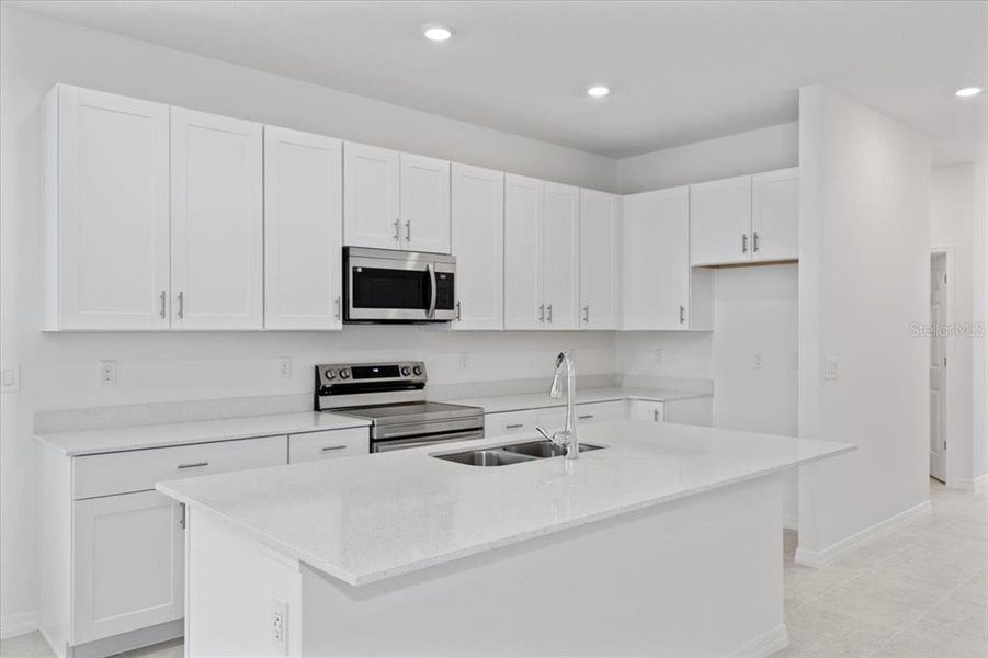 Furnished interior view inside a new home in Mirror Lake Village, Fruitland Park (Image 3).