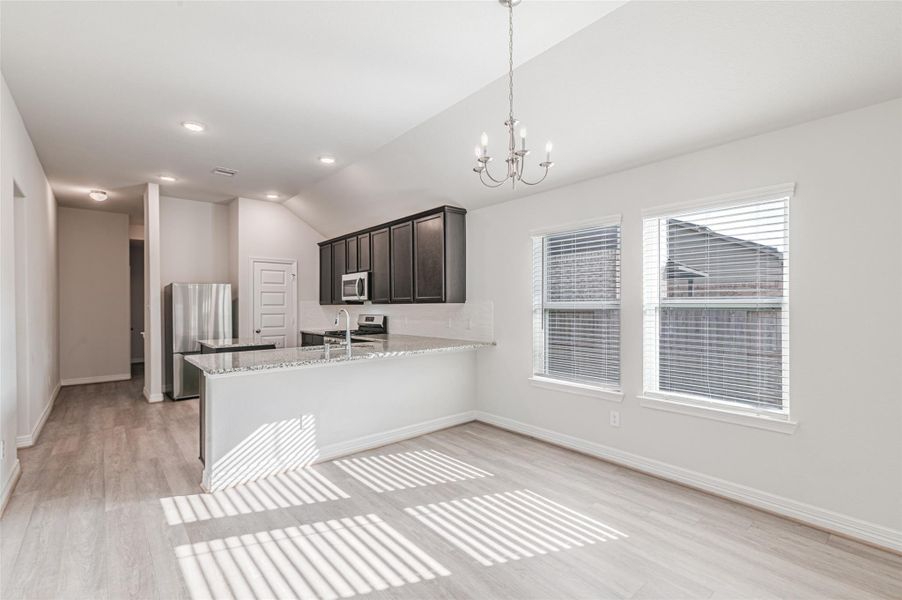 Furnished interior view inside a new home in Marvida, Cypress (Image 12).
