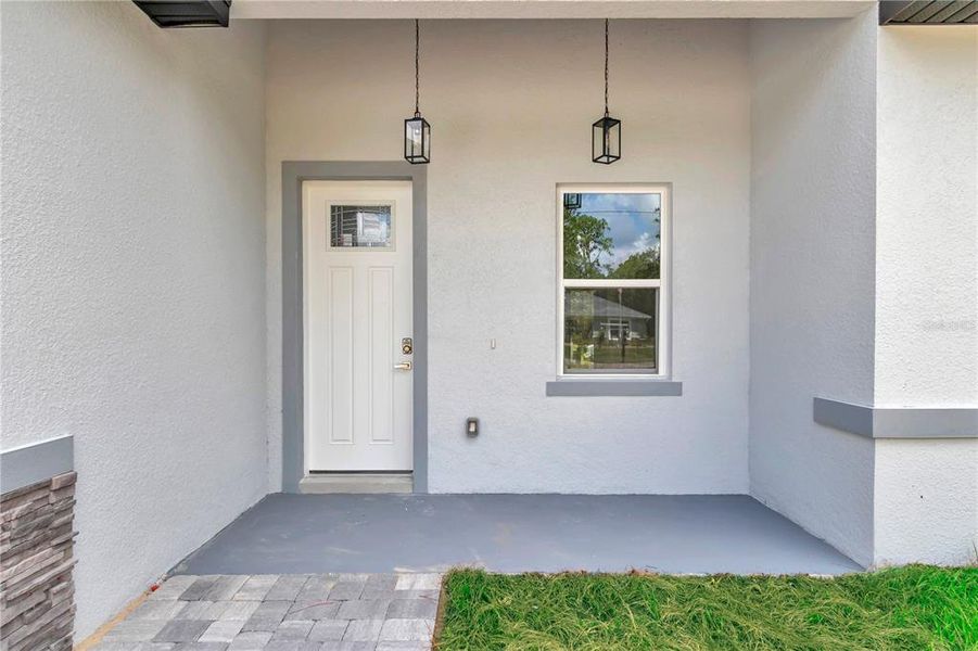 Exterior details and patio area of a home in , Citrus Springs (Image 27).
