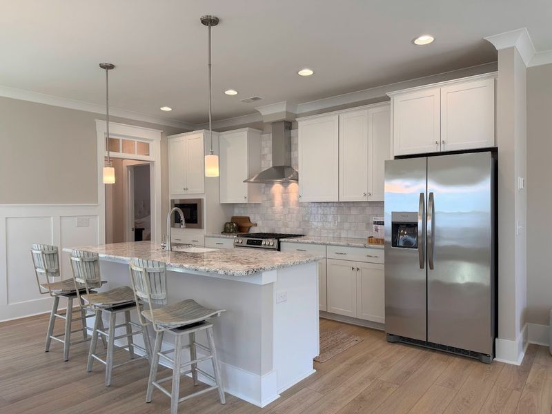 Furnished interior view inside a new home in Osprey Landing, Southport (Image 8).