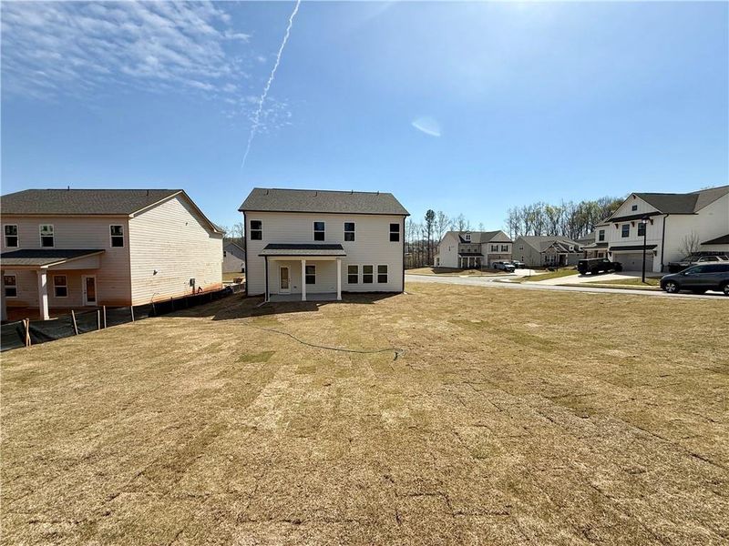 Exterior details and patio area of a home in Ponderosa Farms Estates, Gainesville (Image 22).