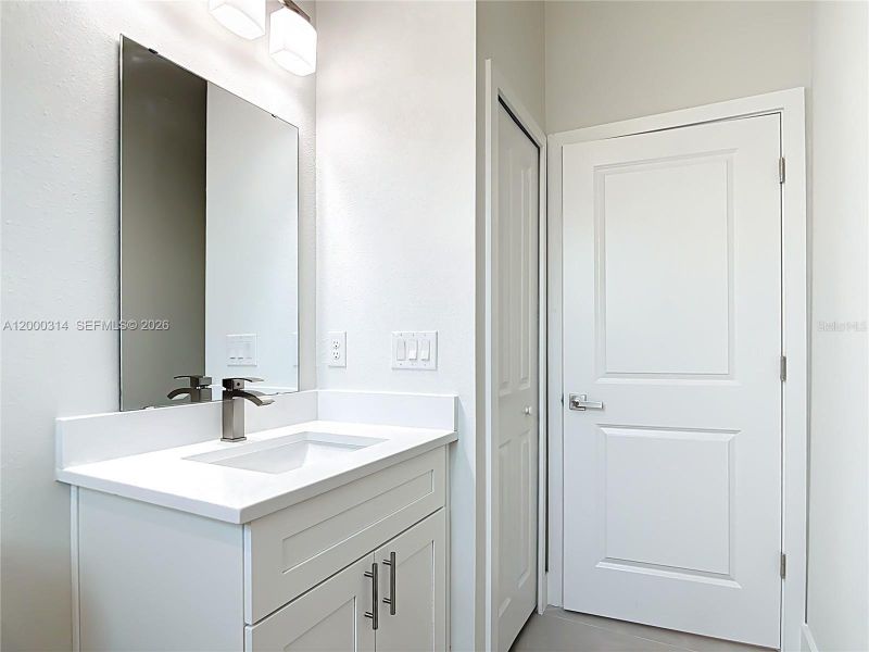 Furnished interior view inside a new home in , Port Charlotte (Image 10).