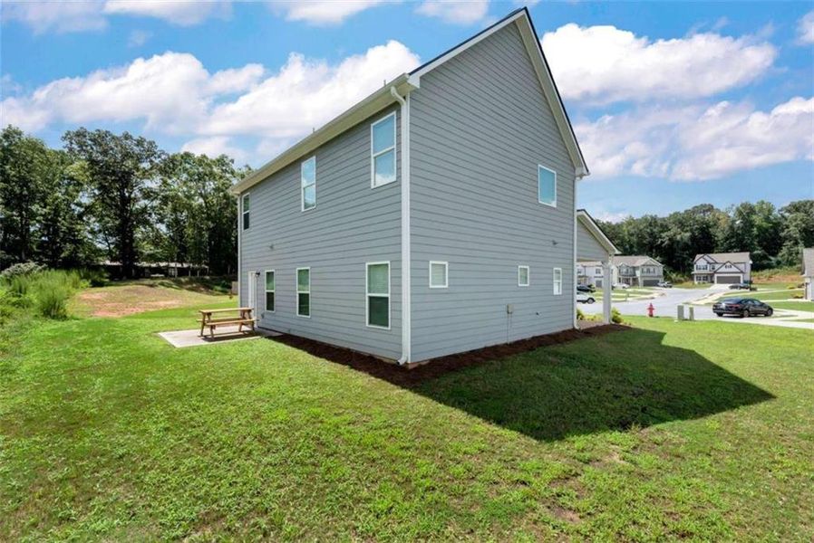 Front exterior of a new home in , Commerce, GA, highlighting curb appeal (Image 27).