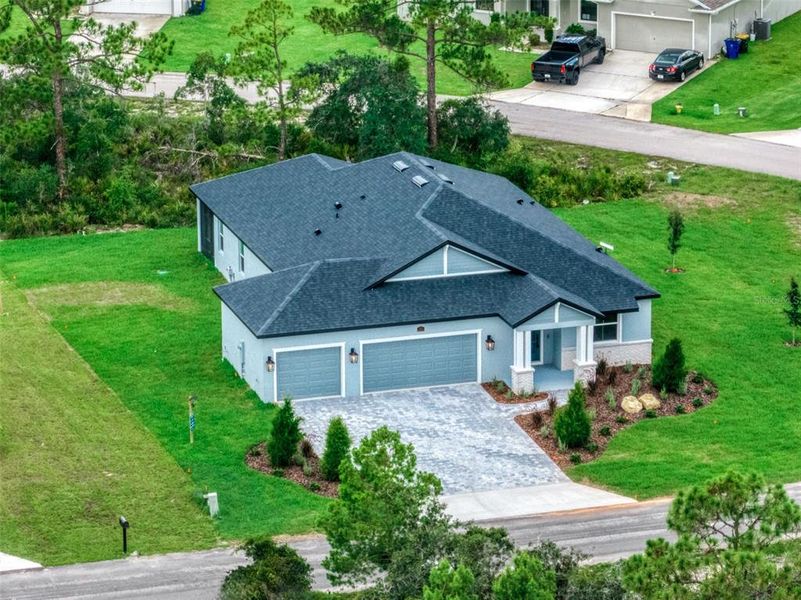 Front exterior of a new home in , Sebring, FL, highlighting curb appeal (Image 27).