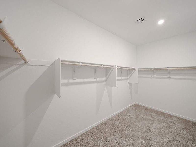 A white staircase in a room.