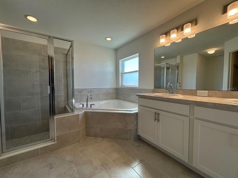 Furnished interior in a model home at James Farms in Bartow (Image 25).