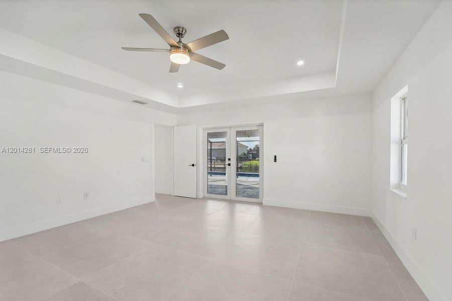 Spacious, unfurnished interior of a new home in , Port Charlotte (Image 28).