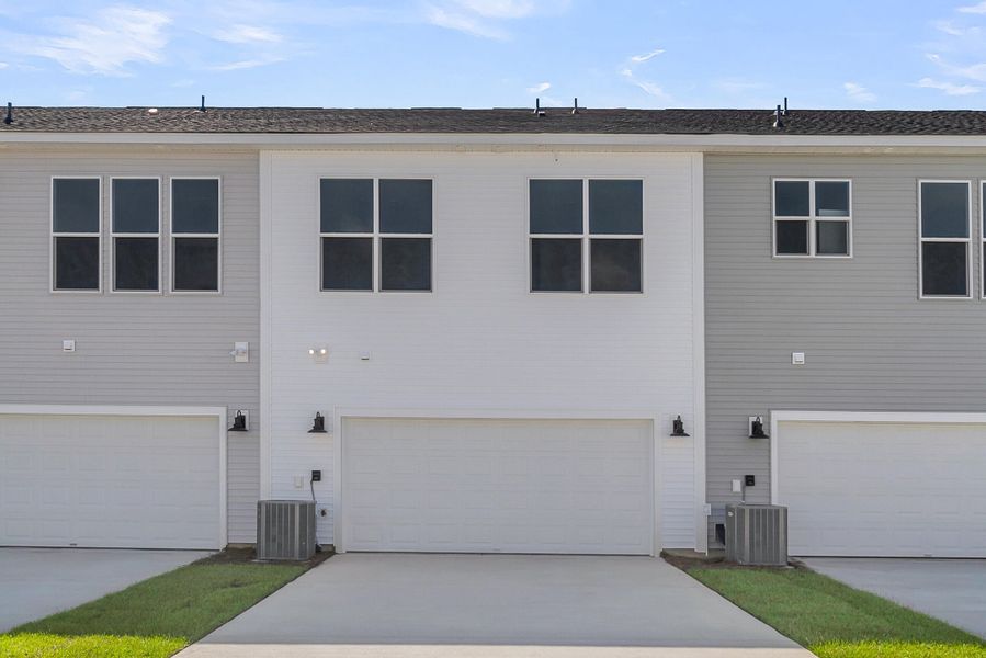 Exterior details and patio area of a home in Six Oaks, Summerville (Image 4).