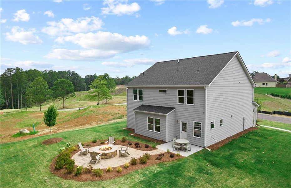 Exterior details and patio area of a home in Watermist at Mirror Lake, Villa Rica (Image 25).