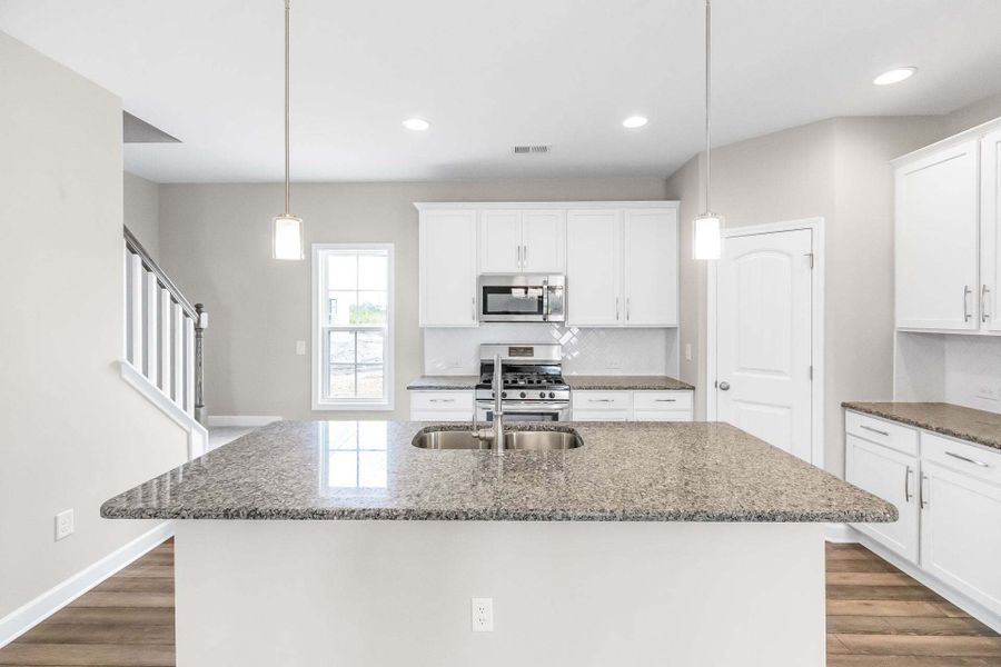 Representative furnished interior of a home built from the Aberdeen by Caviness & Cates Communities in Bartlett Manor, Youngsville (Image 153).