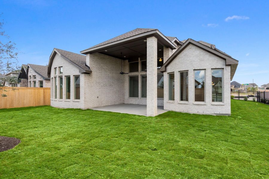 Exterior details and patio area of a home in Bridgeland 55', Cypress (Image 4).
