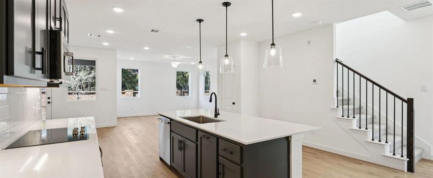 Open Kitchen-Living-Dining Room featuring the Minimalist Collection