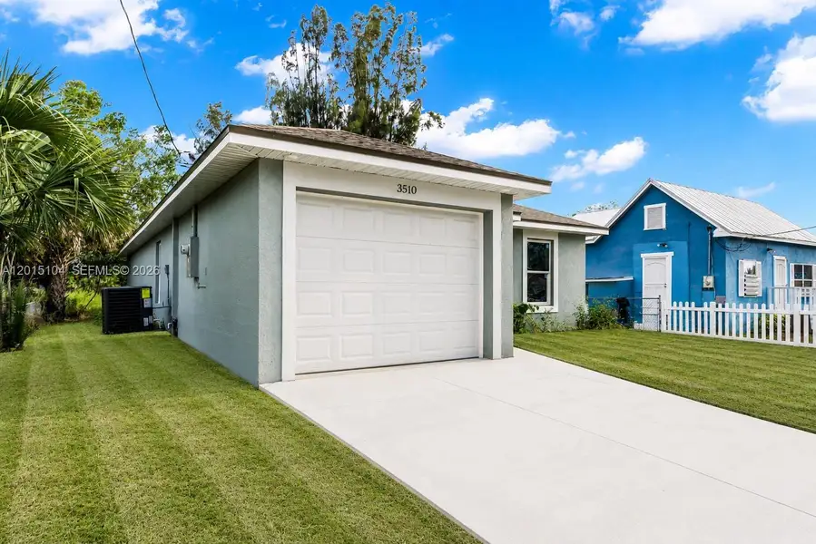 Front exterior of a new home in , Fort Myers, FL, highlighting curb appeal (Image 1). Front exterior of a new home in , Fort Myers, FL, highlighting curb appeal (Image 1).
