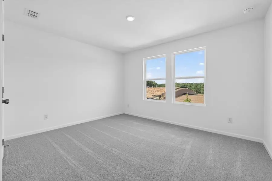 Spacious, unfurnished interior of a new home in Weatherfield, Buford (Image 27).