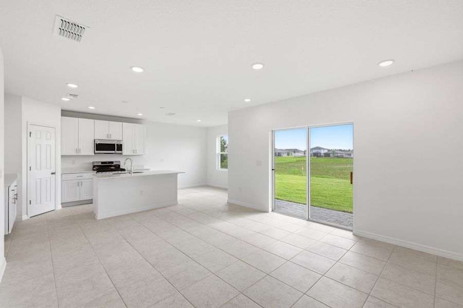 Spacious, unfurnished interior of a new home in Highfield at Twisted Oaks, Wildwood (Image 12).