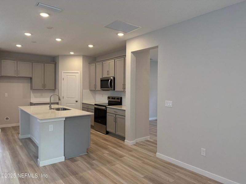 Furnished interior view inside a new home in The Preserve at Concourse Crossing, Fernandina Beach (Image 4).