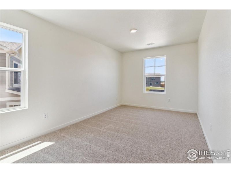 Spacious, unfurnished interior of a new home in Silver Peaks, Lochbuie (Image 17).