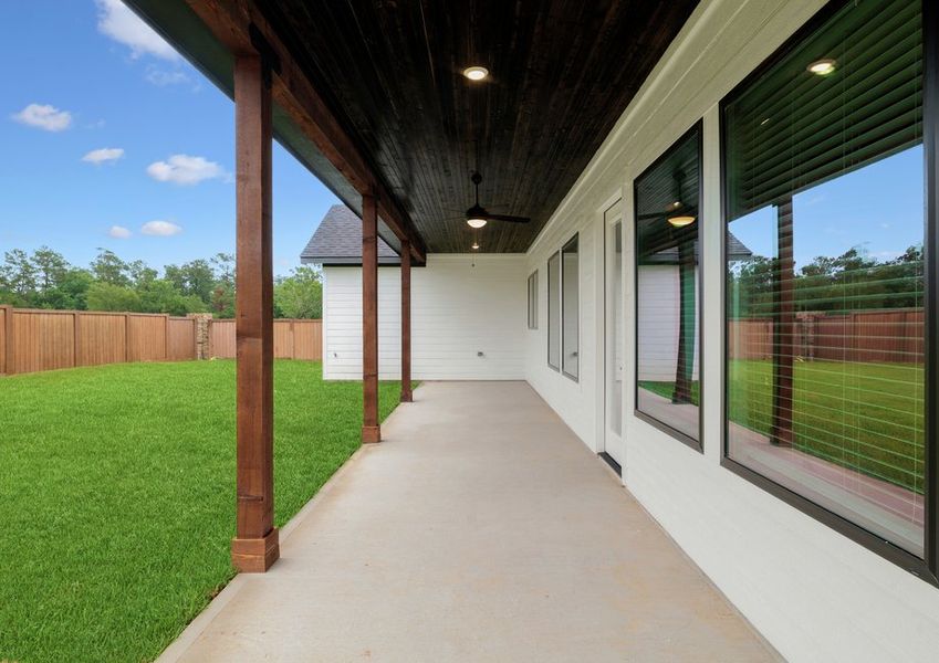 Sprawling covered outdoor living area. Sprawling covered outdoor living area.
