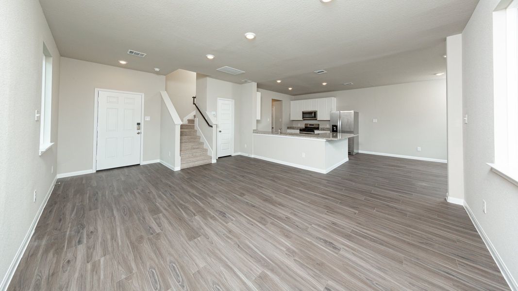 Family Room to Kitchen and Dining Area