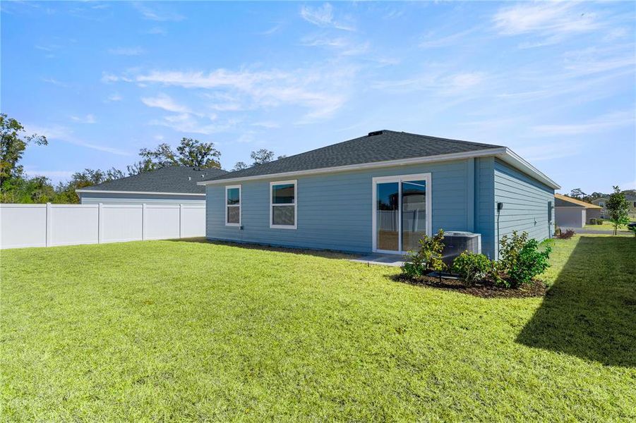 Exterior details and patio area of a home in Marion Ranch, Ocala (Image 4).