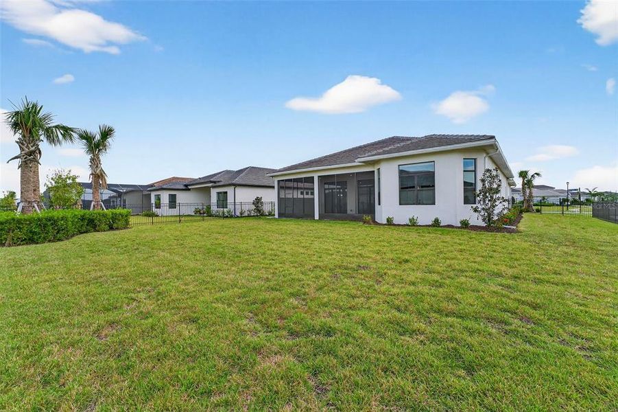 Exterior details and patio area of a home in , Sarasota (Image 2).