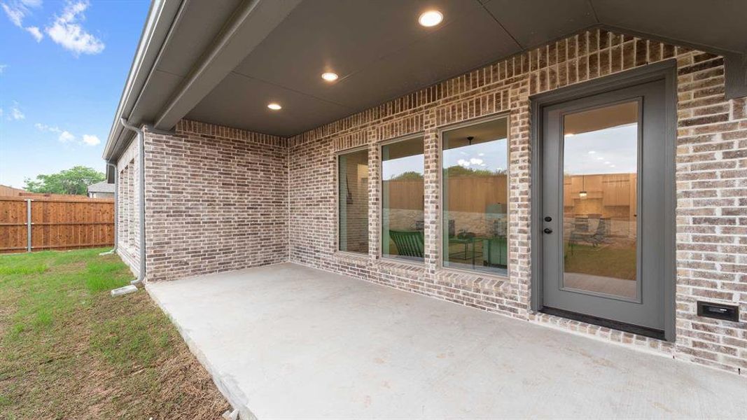 Exterior details and patio area of a home in The Heights at Uptown Celina, Celina (Image 2).