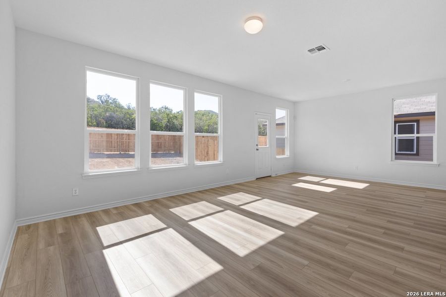 Spacious, unfurnished interior of a new home in Hidden Bluffs at TRP, San Antonio (Image 16).