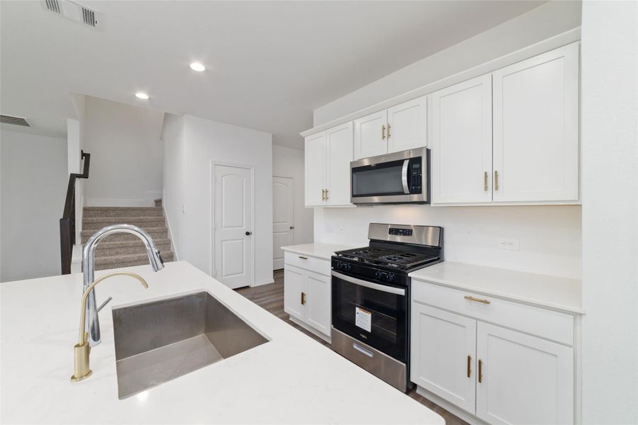Furnished interior view inside a new home in Sunterra, Katy (Image 10).