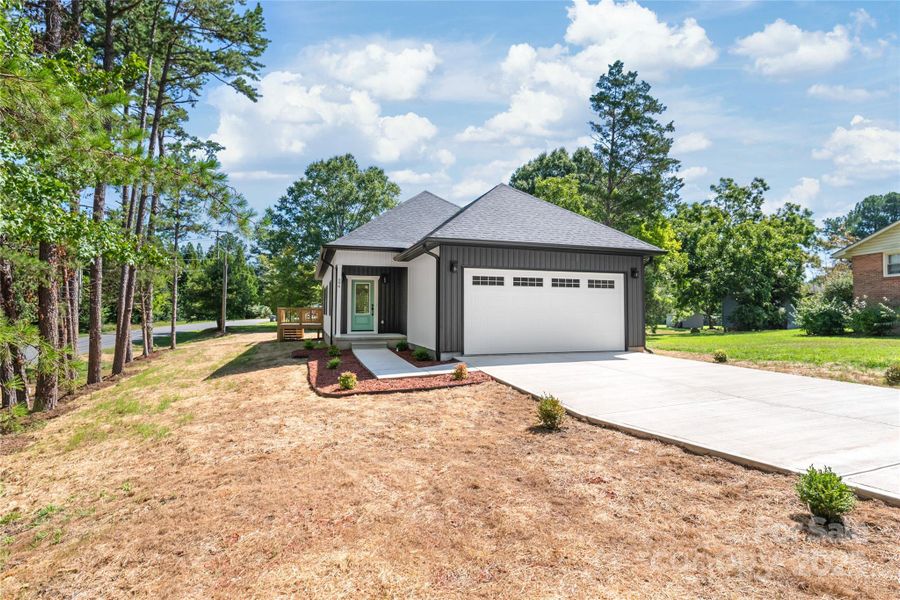 Front exterior of a new home in , Concord, NC, highlighting curb appeal (Image 2). Front exterior of a new home in , Concord, NC, highlighting curb appeal (Image 2).
