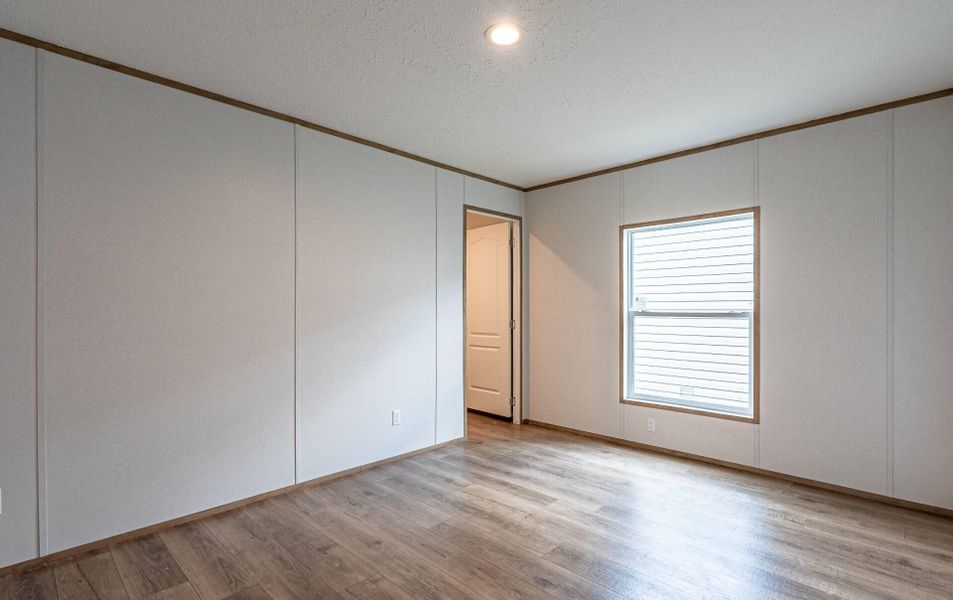 Spacious, unfurnished interior of a new home in , Wallace (Image 9).