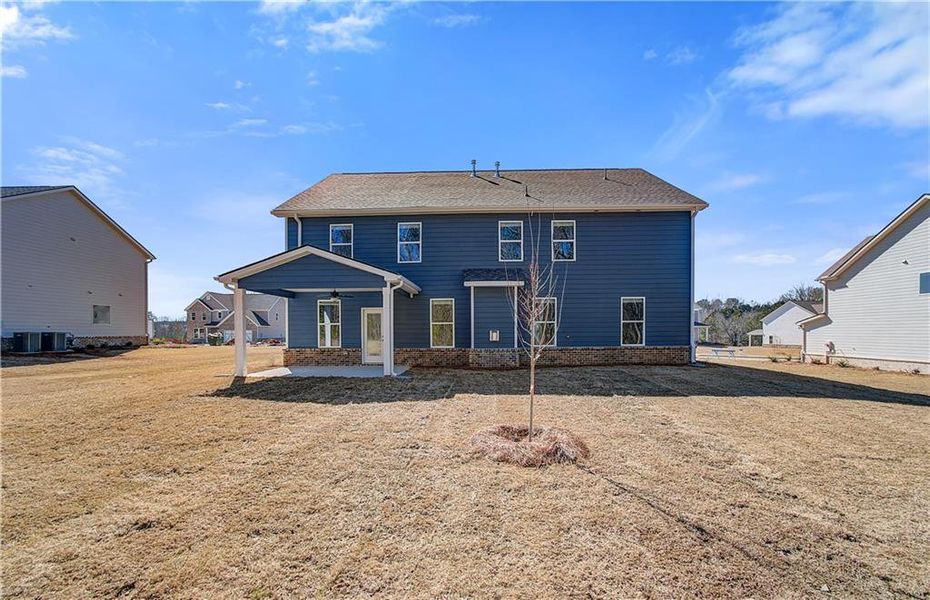 Exterior details and patio area of a home in Copperfield, Locust Grove (Image 3).