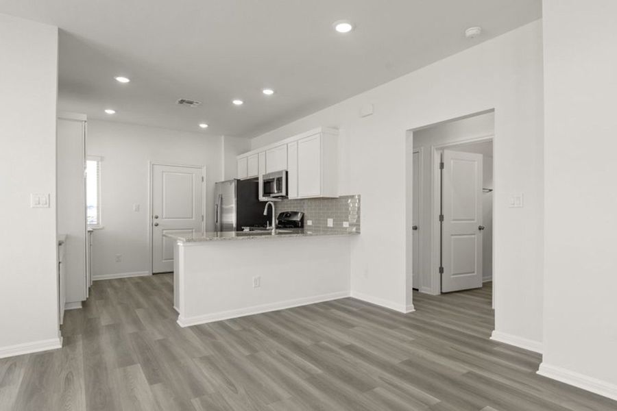 Representative furnished interior of a home built from the Frisco by Pacesetter Homes in Blanco Vista, San Marcos (Image 8).