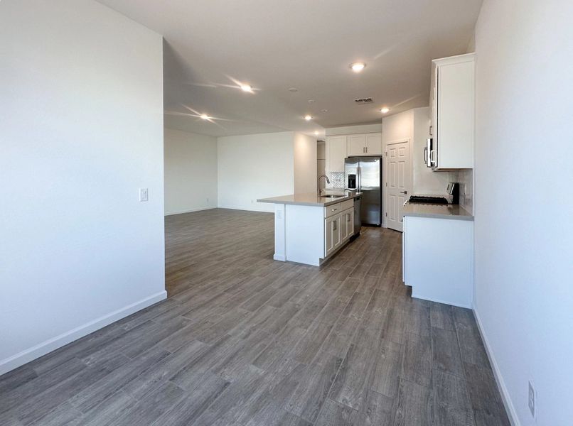 Dining into kitchen and great room Dining into kitchen and great room